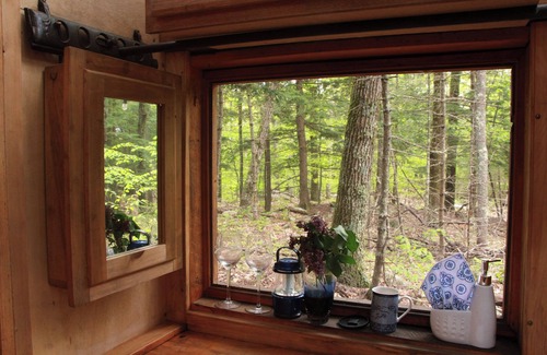 Canterbury Cabin | Stone Haven "Tent Cabin" with a cast iron fire pit in Canterbury, NH.