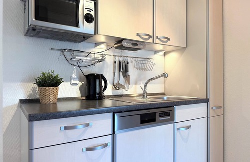 Stickenbuttel Apartment | Strandgold 1 - Cozy vacation apartment with terrace and garden