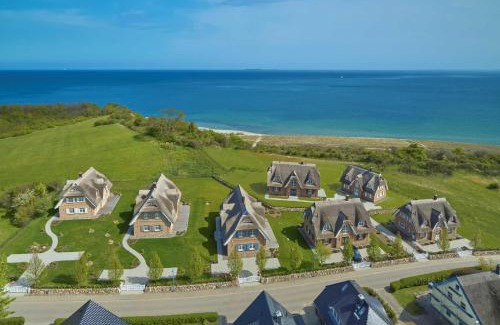Lobbe Villa | Strandhaus 7 "Ostsee" in Lobbe mit Meerblick, Sauna, Kamin