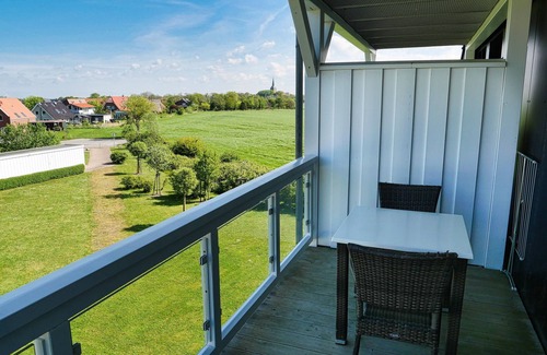Wremen Apartment | Strandnahe Ferienwohnung mit Sauna & Schönem, Überdachten Balkon mit Deichblick