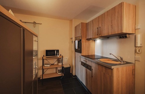 Wremen Apartment | Strandnahe, Hübsche Wohnung mit Sauna und Balkon mit Blick zum Nordseedeich