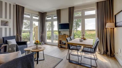 Fehmarnsund Apartment | Strandresidenz Vogelflug Meerblick Porschen