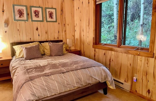 Lyons Cabin | Streamside Cabin nestled in Rock Canyon Walls with Creek flowing through it
