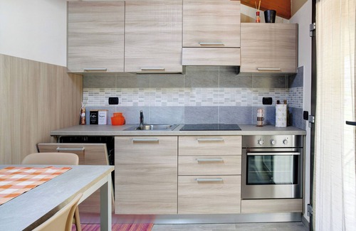 Talamona Apartment | Studio 'Agriturismo L'isola Del Cavallo 2' with Mountain View, Shared Garden and Wi-Fi