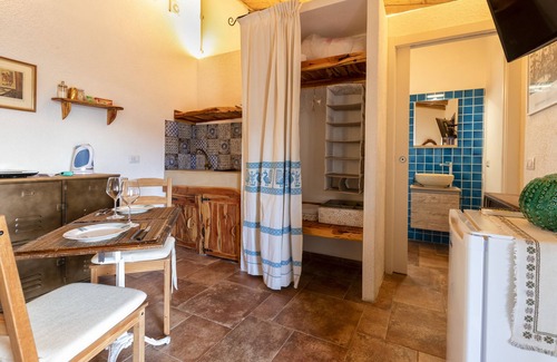 Trinita d'Agultu Apartment | Studio Apartment 'Stazzo Jana' with Sea View, Private Terrace and Air Conditioning