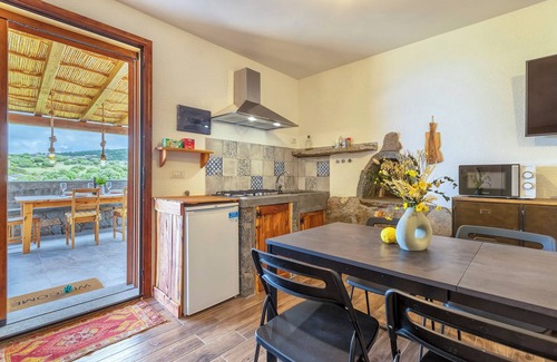 Trinita d'Agultu Apartment | Studio Apartment 'Sa Domo Isola Rossa' with Sea View, Private Terrace and Air Conditioning