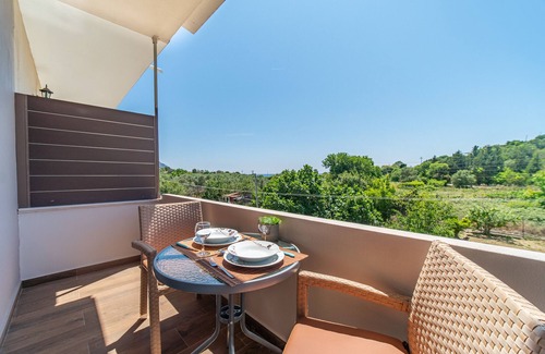 Agios Georgios Pagon Apartment | Studio Apartment "Angel's Studio 2" with Mountain View, Balcony & Wi-Fi