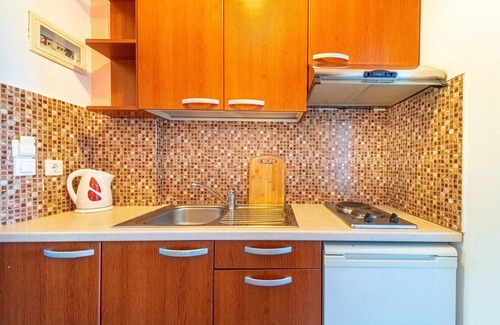 Lakones Apartment | Studio Apartment "Arianna Studio Ground Floor 4" with Sea View, Shared Pool & Wi-Fi
