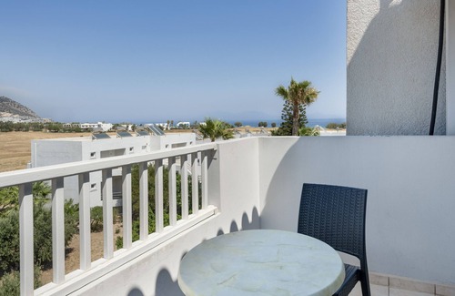 Kardamena Apartment | Studio Apartment 'Evripides Triple Room 1' with Shared Pool, Shared Garden and Air Conditioning