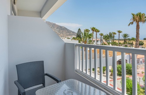 Kardamena Apartment | Studio Apartment 'Evripides Triple Room 2' with Shared Pool, Shared Garden and Air Conditioning