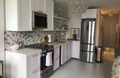 Condado Apartment | Studio Apartment right on the beach with city views, pool, gym and game room