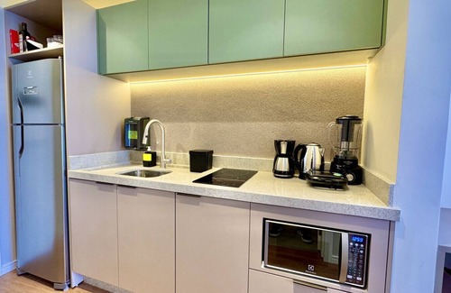 Matriz Apartment | Studio near Shopping Mueller complete with parking space and air conditioning