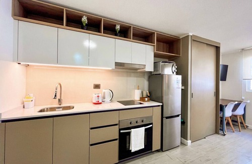 Downtown Santiago Apartment | Studio Santa Elvira - Laundry Wifi