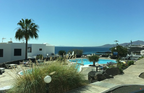 Puerto del Carmen Apartment | Stunning 2 bedroom apartment located on the seafront opposite the main beach