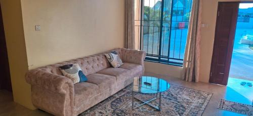 Mlingotini Apartment | Stunning 2BR in Dar Beach, Dining, Transit Nearby