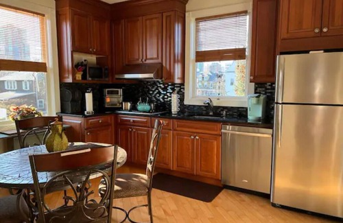 New Rochelle House | Stunning 4-Bedroom, 2-Kitchen Home w/Attic – 38 Minutes from NYC by Train
