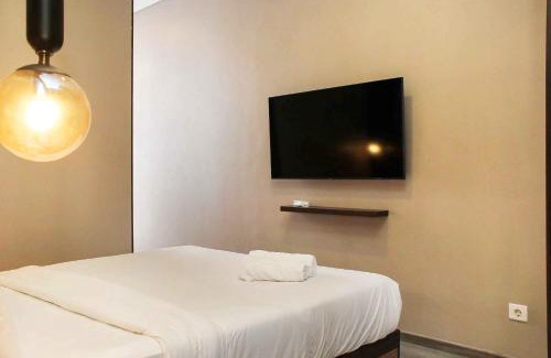Bendungan Hilir Apartment | Stunning and Comfy 2BR + Study Room at Sudirman Suites Apartment By Travelio