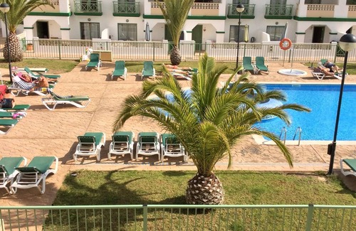 Caleta de Fuste Apartment | STUNNING ART DECO 'GAUDIA' COMPLEX REFURBISHED POOLSIDE DUPLEX APARTMENT