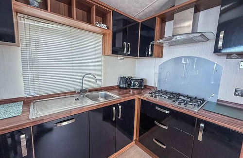 Hopton House | Stunning caravan with full sea views at Hopton Haven ref 80044S