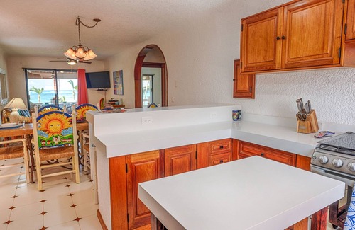 Akumal Condo | Stunning Caribbean views from the wrap around deck, at this beachfront condo!