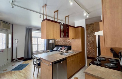 Saint-Jean-Baptiste Condo | Stunning condo in an old grocery store
