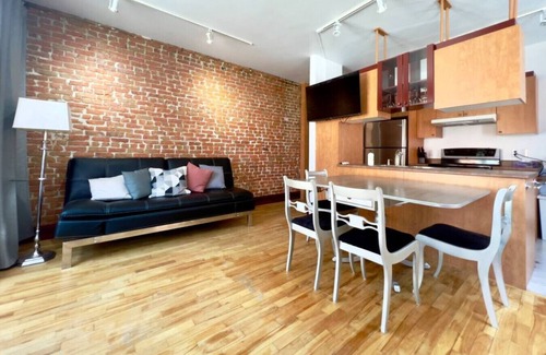 Saint-Jean-Baptiste Condo | Stunning condo in an old grocery store