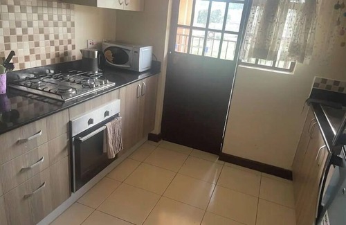 Nairobi West Condo | Stunning condo with a rooftop pool & terrace + panoramic city views