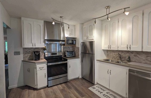 Taku - Campbell House | Stunning creekview home, centrally located. With all the extras.