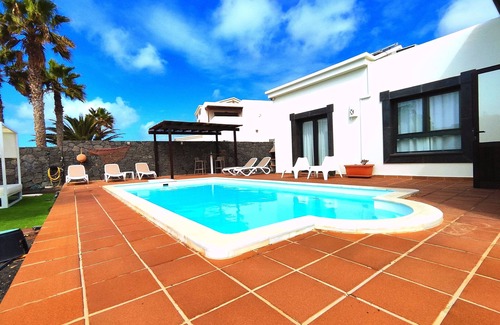 Playa Blanca Villa | Stunning detached villa with sea view, beautiful landscaped gardens, A/C & wifi
