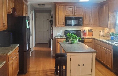 High Point House | Stunning home located in the heart of the Triad with an immaculate outdoor area and updated furnishings.