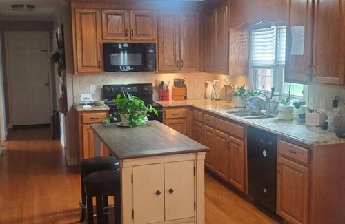 High Point House | Stunning home located in the heart of the Triad with an immaculate outdoor area and updated furnishings.