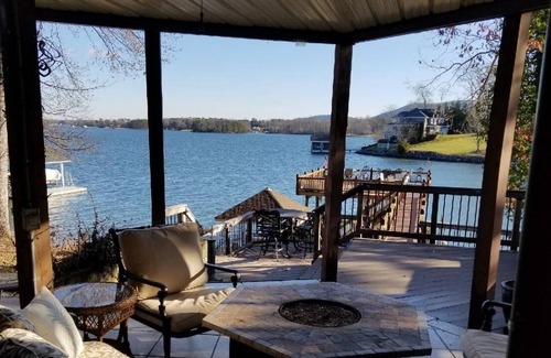 Penhook House | Stunning lake front with private dock and pontoon boat available for rent