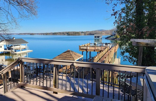Penhook House | Stunning lake front with private dock and pontoon boat available for rent