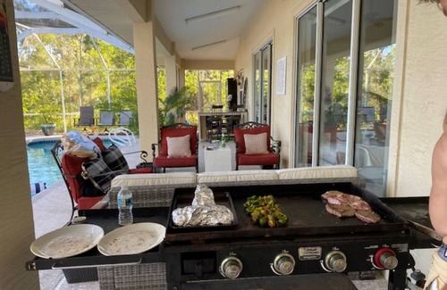 Palm Coast House | Stunning Lake house,heated pool, pet friendly,close to beach, restaurants ,bars