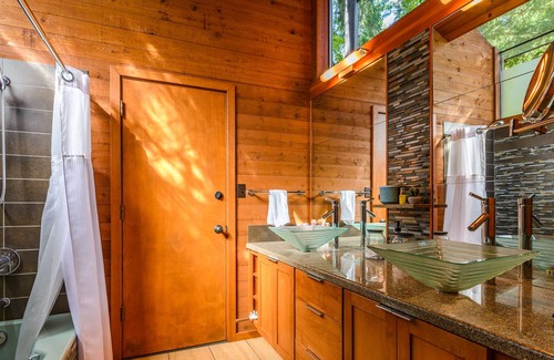 Grapeview House | Stunning lakefront home with a private dock, balcony, grill, & a hot tub