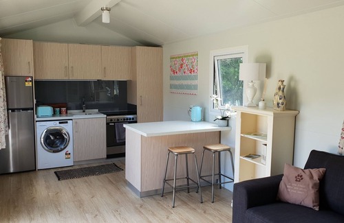 Shakespeare Bay Cottage | Stunning location garden setting, farmstead cottage!
