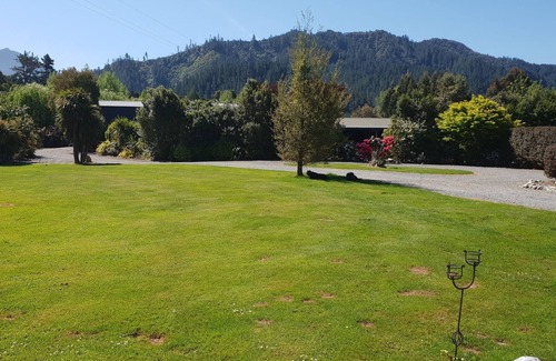 Shakespeare Bay Cottage | Stunning location garden setting, farmstead cottage!