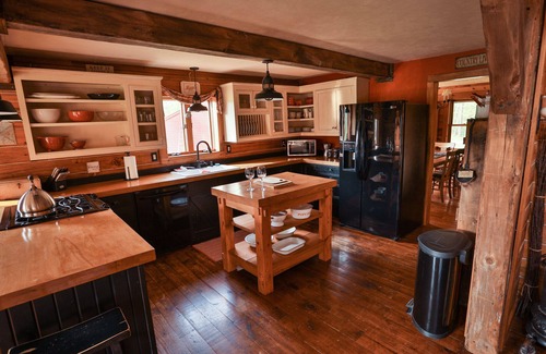 Nekoosa House | Stunning Log Cabin in native prairie woodland setting