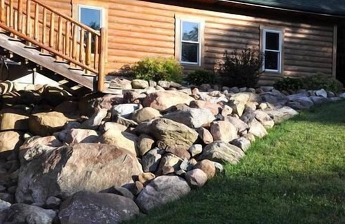 Homerville Cabin | Stunning Log Cabin on 65 Acres with a new swimming pool