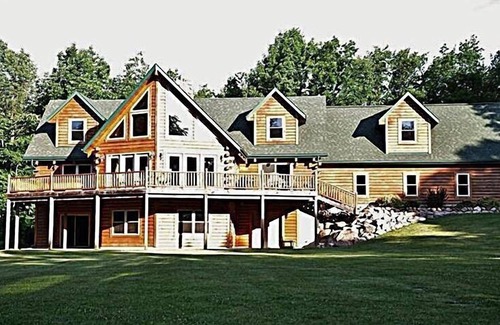 Homerville Cabin | Stunning Log Cabin on 65 Acres with a new swimming pool