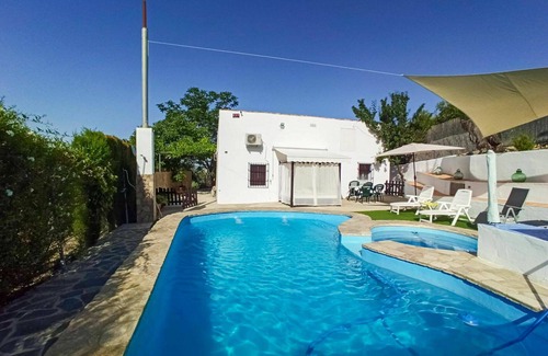 Cabra Villa | Stunning private villa with A/C, hot tub, WIFI, private pool, TV, terrace, pets allowed and park.