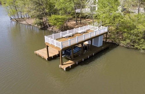 Macon House | Stunning property with 2 docks, kayaks, SUP, firepit, hammock & huge water mat