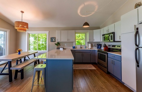 Montague House | Stunning renovated cottage with 150' of private sandy Lake Michigan beachfront!