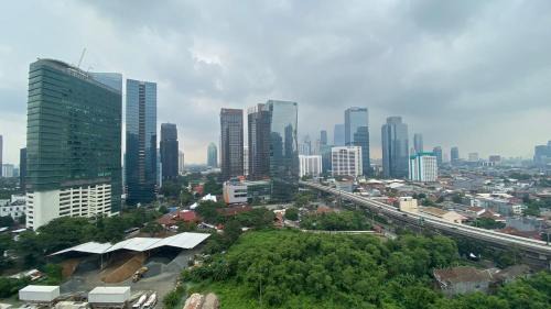 Semanggi Apartment | Stunning Studio at Ciputra World 2 Apartment By Travelio