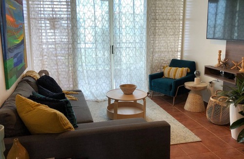 Miradero Condo | Stunning sunsets, beaches ,Seafood delights, WiFi, Full A/C