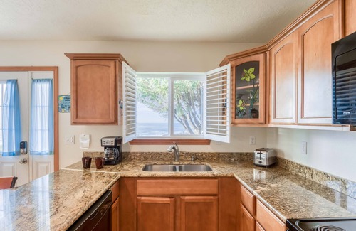 Beverly Beach House | Stunning views and sunsets from this pet friendly oceanfront home with a hot tub