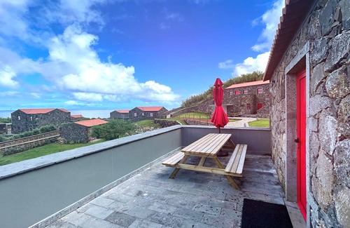 Calheta House | Stylish 1 Bedroom Stone House With Sea View In São Jorge, Azores (Belo Malandro)