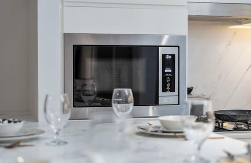 Dubai Apartment | Stylish 1BR | City & Creek Views, Near Downtown Dining & Attractions