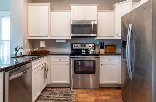 Central Business District Apartment | *Stylish 1BR Getaway w/KING Bed + Patio + Wi-Fi