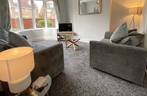 Doncaster House | Stylish, 3-bedroom home, with parking on premises